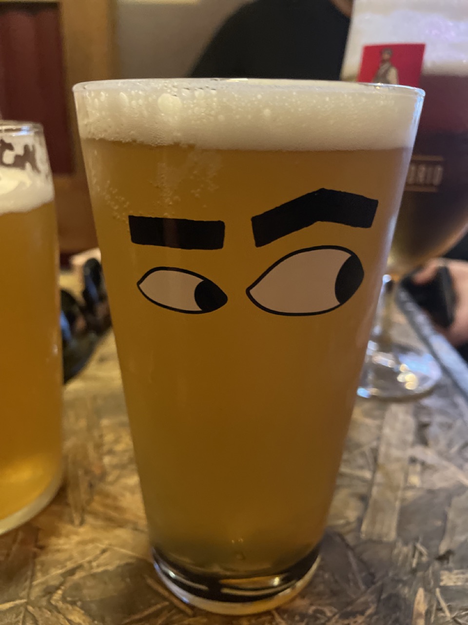 A glass with some shifty eyes