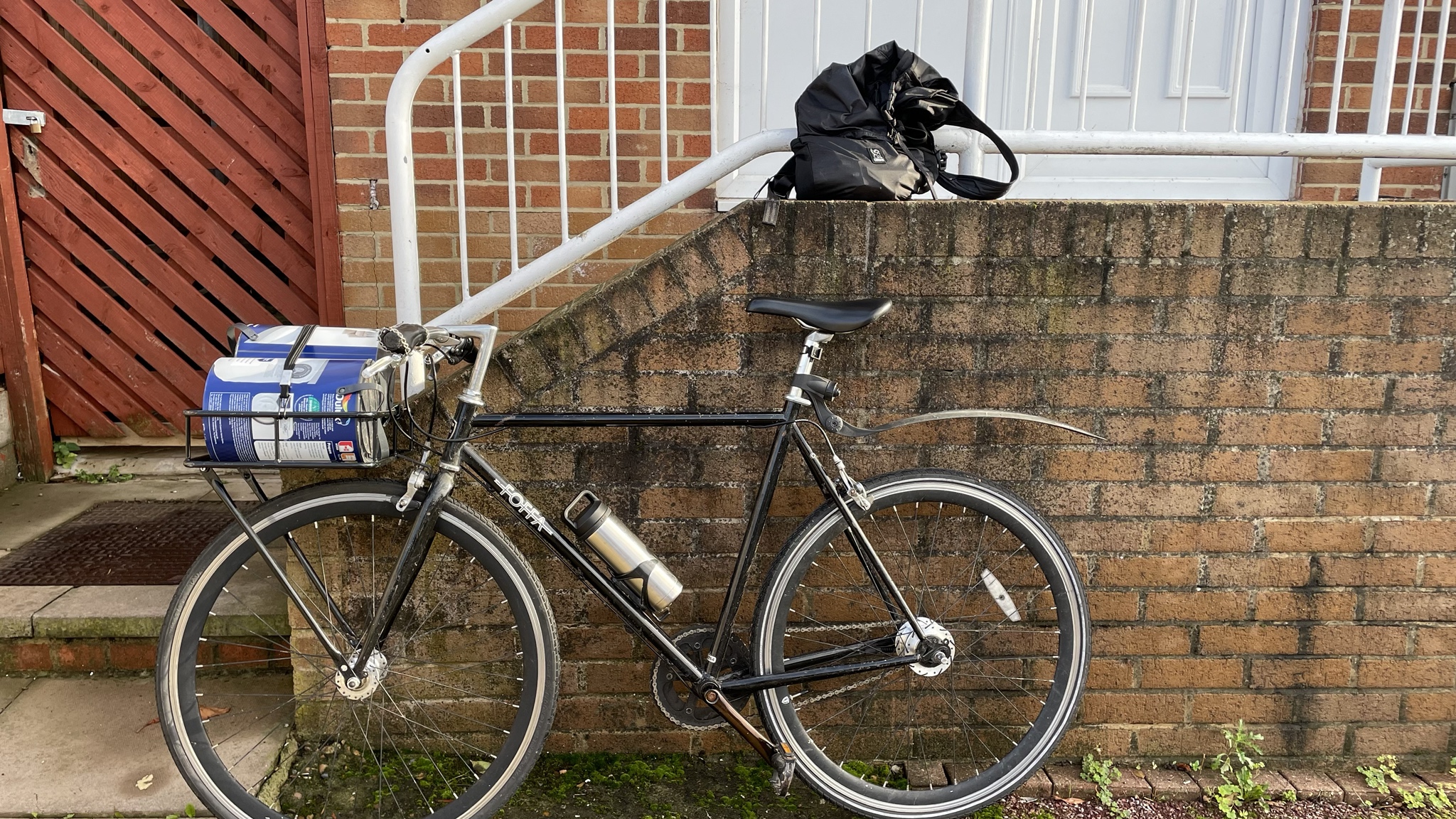 My bike with two 5 litre cans of paint